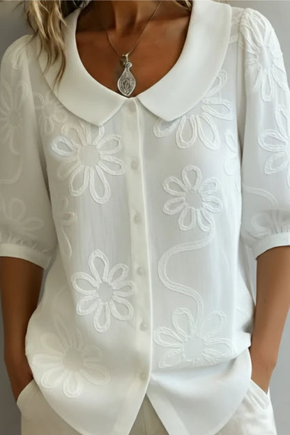 FIONA | Blusa fluida con acabado delicado